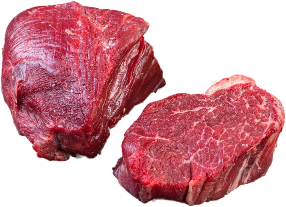 Raw red game cuts on slate